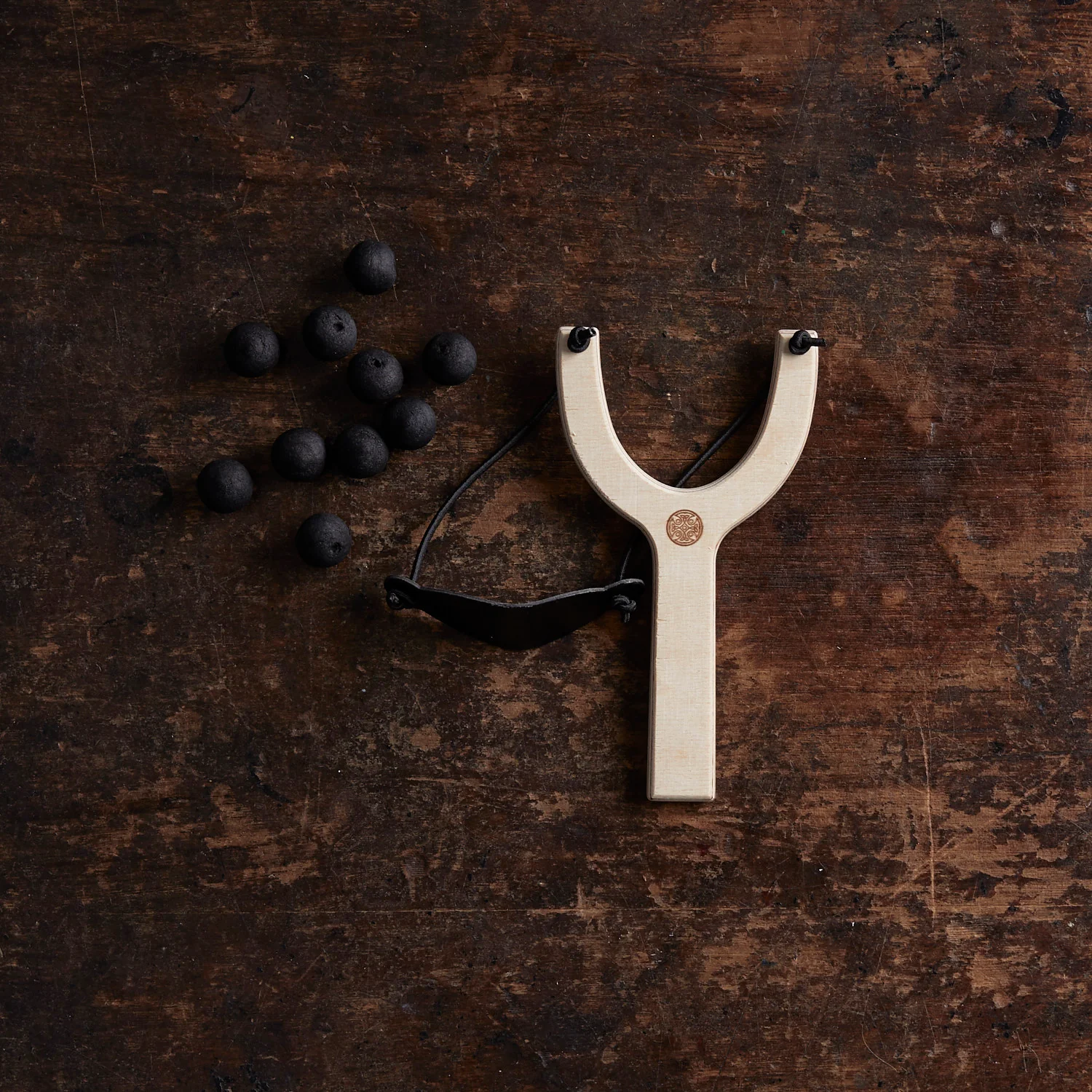 Wooden Slingshot with Wadded Paper Bullets - Image 3